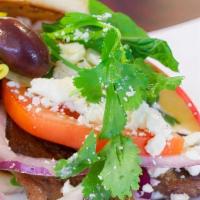 Traditional Gyro · One Stop Market and Greek Kouzina favorite: 
Choice of lamb or chicken or beef. Served with ...