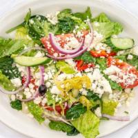 Greek Salad · Crisp romaine lettuce, red onions, tomatoes, olives, cucumber, pepperoncini, seasonal veggie...