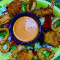 Fried Coconut Shrimp & Calamari · Spicy.  Served with special spicy sauce.