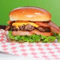 Bacon Cheese Burger (Standard) · Hardwood smoked honey cured pepper bacon. 1/3 pound burger served on a grilled bun.