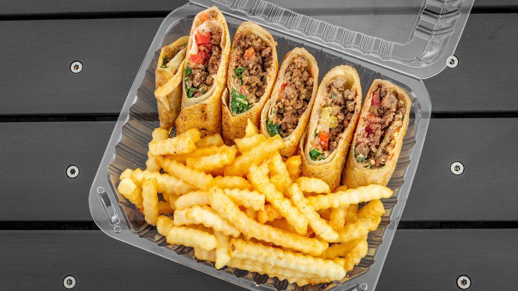 Lamb Arabi With Fries · Wrapped in saj bread. Cut to small bite-size pieces and served on a bed of fries.
