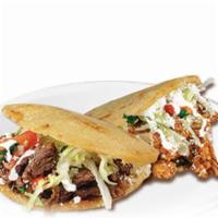 Combo #66 (2) Gorditas  · Two thick handmade tortilla filled with refried beans, with meat choice, onions cilantro, sa...