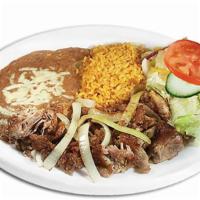 Antojo Carnitas · Tender pork fried with onions and spices. Served with rice, beans and handmade tortillas.
