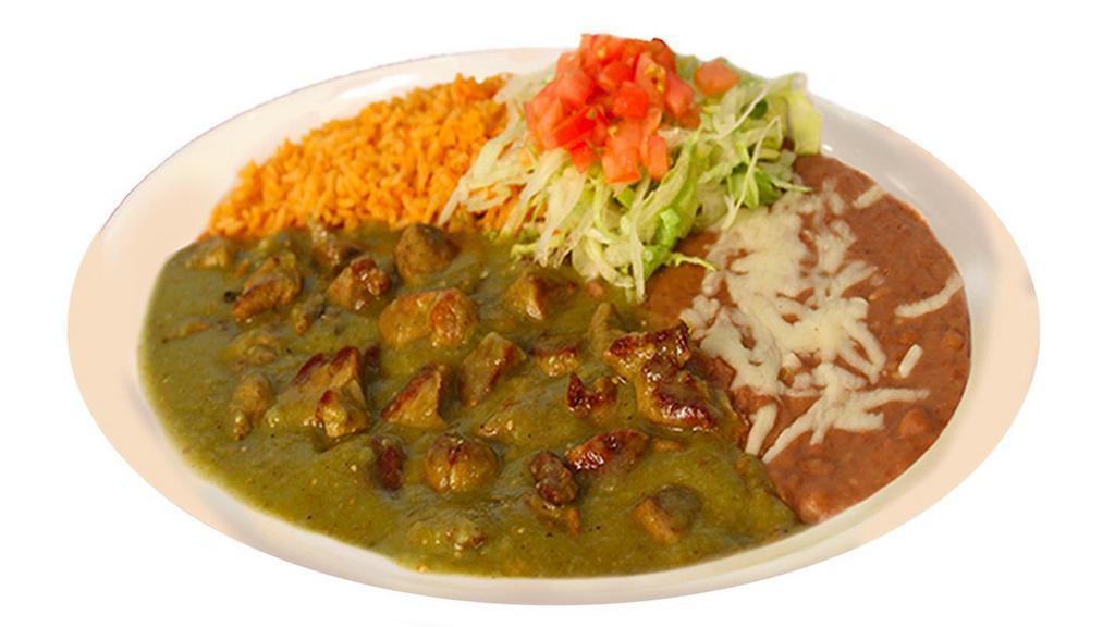 Pork On Chile Verde · Pork cubed cooked in a tomatillo salsa verde. Served with rice, beans and handmade tortillas.