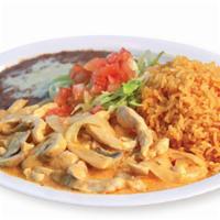 Pollo A La Crema · Chicken breast strips in a delicious Mexican cheese cream sauce with mushrooms and onions. G...
