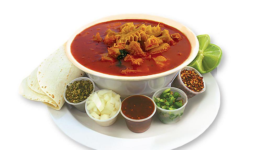 Menudo · A spicy tripe stew. Add oregano, onions, crushed peppers, fresh jalapeño peppers, salsa and lime juice to your liking. Served with handmade tortillas.