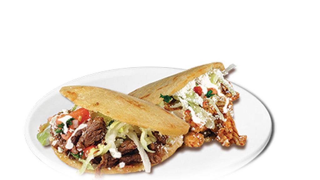 Single Gordita · A thick handmade tortilla filled with refried beans, with meat choice, onions cilantro, salsa, lettuce, tomatoes, Mexican cheese, and Mexican cream.