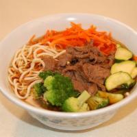 Beef Noodle Soup · Savory light broth with noodles.