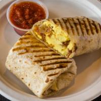 Breakfast Burrito · With egg, potato, cheddar cheese and choice of meat wrapped with flour tortilla.