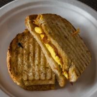 Grilled Sourdough Sandwich · With egg, cheese. Add choice of meat for extra.