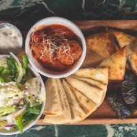 Greek Plate · Dolmades, Spanakopoita, Pita Bread, Meatballs, Tzatziki Sauce, Greek Salad