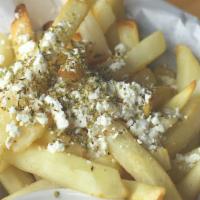 Greek Fries · Fries seasoned with Greek Oregano and feta cheese and served with special sauce
