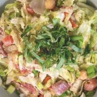Chopped Salad · Chopped lettuce, tomatoes, garbanzo beans, salami, chicken, mozzarella, scallions, basil wit...