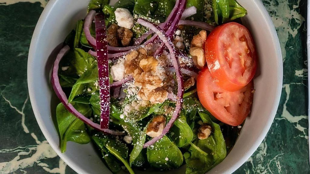 Spinach Salad · Fresh Spinach, Tomatoes, Goat Cheese, Red Onions, Walnuts with Balsamic Vinaigrette Dressing