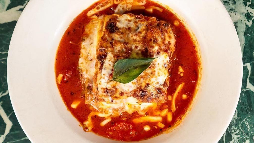 Beef Lasagna · Flat sheet pasta layered with slow cooked meat sauce, creamy bechamel, parmigiano and whole milk mozzarella cheese