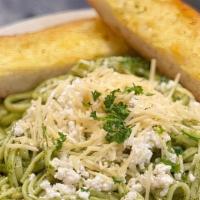 Pesto Linguine · Fresh linguini in butter, garlic and pesto sauce, topped with feta, Parmesan and pine nuts