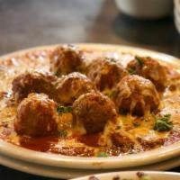Meatball Dish · Meat sauce, meatballs, topped with mozzarella & Parmesan cheese, oven baked