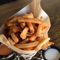 Fresh Hand-Cut Fries · Freshly made, hand cut French fries served with Peppercorn Ranch & Sriracha Fry Sauce