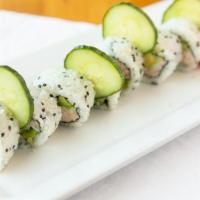 Cali Roll · Crab, avocado, cucumber and sticky rice rolled in nori and sesame. Served with soy sauce and...