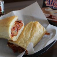 The Rocky · Italian meatball covered in marinara sauce, Mozzarella cheese and grated Parmesan.