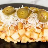 Ddabble Potato  · ½ Mozzarella & ½ Sausage & 
Jalapeno Cheese Peppers 
& Potato with Nacho Cheese Sauce 
& Shr...