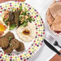Vegetarian Platter (Veg) · Five pieces falafel and two pieces dolmas. Served with hummus, baba ghanaous, fattoush salad...