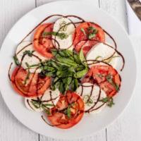 Caprese Salad · (fresh mozzarella, fresh basil, tomatoes with virgin olive oil and balsamic reduction)