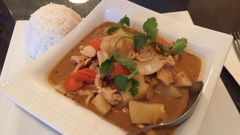 Massaman Curry · Potatoes, carrots, onions, peanuts, and massaman curry paste in coconut milk. Comes with side of rice.
