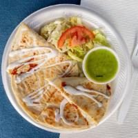 Meat Quesadillas · Meat selection. Topped with sour cream and side of salsa. Choose a meat: Asada (Steak), Al P...
