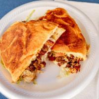 Tortas · Meat selection. Includes beans, sour cream, lettuce, tomatoes, cilantro, onions and salsa.Ch...