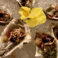 Fresh Oyster · Half dozen fresh oysters drizzled in spicy chili lime sauce topped with fried shallots.