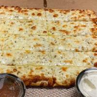 Cheesy Bread Sticks  · 12 Pieces of Cheesy Goodness, Topped with a bit of Romano cheese. Served with a side of ranc...