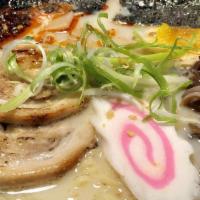 Shio Ramen · Sea Salt Soup Base, Porkbone broth, seared cha-she pork belly, bamboo, nori, tamale(egg), fi...