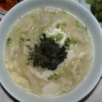 Dumpling & Ricecake Soup · Sliced Rice Cake, Pot Stickers,  Hot Broth, Vegetables, egg, Seaweed.