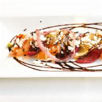 Organic Roasted Beets Salad · Vegetarian. Crumbled Feta, pickled red onions, organic Green, roasted pistachio, sliced oran...
