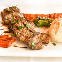 Turkish Grilledmeat (Kofte) Balls · Patties grilled with onions, garlic, grilled Anaheim pepper, and tomatoes served with rice p...
