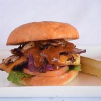Steakhouse Roost Burger · All natural premium 6oz chicken breast on a brioche bun topped with applewood smoked bacon, ...
