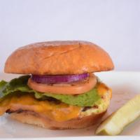 Classic Cheese Roost Burger · All natural premium 6oz chicken breast on a brioche bun topped with cheddar, tomato, red oni...