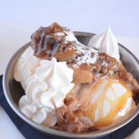 Warm Cinnamon Apple Crisp · Warm pastry filled with sliced apples and baked in a cinnamon sugar glaze.