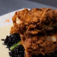 Forbidden Fried Chicken · Our buttermilk fried semi-boneless half chicken perfectly paired with forbidden rice, coconu...