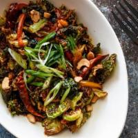 Kung Pow Brussels · crispy brussel sprouts, peppers, spicy house kung pow sauce, cashews, scallions