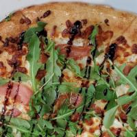 Arugula-Prosciutto · Topped with goat cheese, arugula, prosciutto, and balsamic glaze, bring a taste of Italy hom...