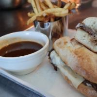 Shorty Dip · Red wine braised short rib, gruyere, horseradish aioli, served on a baguette with shorty jus...