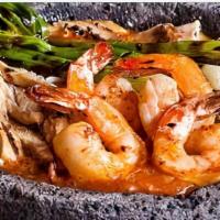 Molcajete · Asada steak, chicken, shrimp, with cactus and cheese.