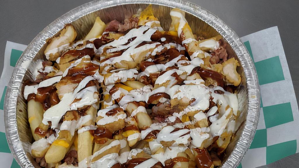 Bbq Chicken Fries · French fries topped with chicken, bacon, mozzarella cheese, BBQ sauce drizzled with ranch dressing