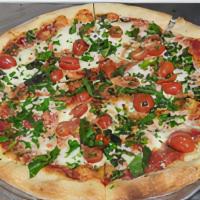 14'' Margherita · Tossed with tomatoes, mozzarella, fresh basil, extra virgin olive oil
