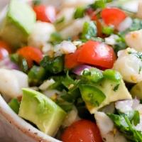 Ceviche · Traditional refreshing shrimp salad hand diced with tomatoes, onion, cilantro, and jalapeño ...