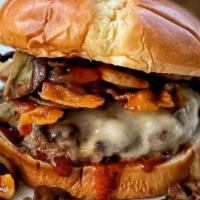 Swiss Burger · Double Beef Patty, Swiss Cheese, Grilled Mushrooms and Caramelized Onion