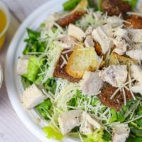 Caesar Salad · Romaine lettuce, heirloom tomatoes, croutons, avocado, Parmesan cheese.