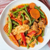 Pad Prik Khing · Quick fried green beans are stir-fried with bell peppers, carrots and chili paste.

Spicy in...